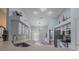 Bright kitchen area with stainless steel appliances and a chandelier at 5424 Frederick Lake Dr, Port Orange, FL 32128