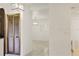 Bright entryway with tiled floors, modern lighting, and access to other rooms in this inviting home at 55 Bay Harbour Dr, Ponce Inlet, FL 32127