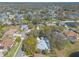Community aerial showcases lovely homes with lush landscaping, near a tranquil lake setting at 6049 Sabal Hammock Cir, Port Orange, FL 32128