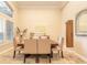 Elegant dining room features a formal table setting with seating for six and ample natural light at 6049 Sabal Hammock Cir, Port Orange, FL 32128