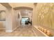 Grand foyer leads into the living room, features high ceilings, and neutral decor at 6049 Sabal Hammock Cir, Port Orange, FL 32128
