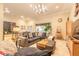 Open-concept living room featuring a plush sectional sofa and stylish furnishings at 6049 Sabal Hammock Cir, Port Orange, FL 32128