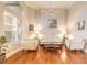 Bright living room featuring hardwood floors, modern furniture, and contemporary decor at 6049 Sabal Hammock Cir, Port Orange, FL 32128