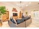 Bright living room with contemporary decor, comfortable seating, and tile flooring at 6049 Sabal Hammock Cir, Port Orange, FL 32128