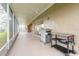 Spacious screened-in patio with an outdoor grill perfect for entertaining at 6049 Sabal Hammock Cir, Port Orange, FL 32128