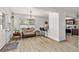 Cozy dining area with stylish chandelier, perfect for Gathering gatherings at 612 Cedar Park Dr, Daytona Beach, FL 32114
