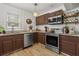 Well-appointed kitchen with stainless steel appliances, ample storage, and natural light at 612 Cedar Park Dr, Daytona Beach, FL 32114