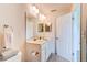 Well-lit bathroom with a large mirror over the vanity, and a clean, neutral color scheme at 612 Mount Olympus Blvd, New Smyrna Beach, FL 32168