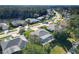 Birds-eye view of the property showing the screened-in pool and location within the residential area at 6456 Cypress Springs Pkwy, Port Orange, FL 32128