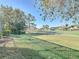 The well-manicured backyard boasts beautiful views of the golf course at 6456 Cypress Springs Pkwy, Port Orange, FL 32128