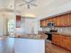 Open kitchen features granite countertops, stainless steel appliances, and tile backsplash at 6456 Cypress Springs Pkwy, Port Orange, FL 32128