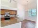 Well-appointed kitchen with granite countertops, stainless steel appliances, and a bright breakfast nook at 6456 Cypress Springs Pkwy, Port Orange, FL 32128
