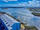 Scenic view of waterfront condominiums offering dock access and stunning water vistas at 6584 Engram Rd # 405, New Smyrna Beach, FL 32169