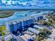 Waterfront condominiums featuring ample parking and boat storage, set against a scenic backdrop at 6584 Engram Rd # 405, New Smyrna Beach, FL 32169