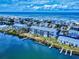 Stunning aerial view of condos on the water featuring private docks, and beautiful ocean views at 6584 Engram Rd # 405, New Smyrna Beach, FL 32169
