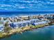 Beautiful aerial view of condos with waterfront access, private docks, and ocean proximity at 6584 Engram Rd # 405, New Smyrna Beach, FL 32169