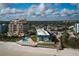An aerial view featuring a beachfront condo with a private pool, deck and adjacent beach access at 701 S Atlantic Ave # 11, New Smyrna Beach, FL 32169