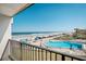 Breathtaking ocean views from the private balcony overlooking the pool and sandy beach, offering tranquility at 701 S Atlantic Ave # 11, New Smyrna Beach, FL 32169
