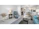 Cozy living room with modern seating, stylish decor, and an open floor plan that flows into the kitchen at 701 S Atlantic Ave # 11, New Smyrna Beach, FL 32169