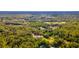 Secluded property surrounded by abundant trees and lush greenery, creating a private oasis at 725 Ingham Rd, New Smyrna Beach, FL 32168