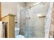 Bathroom with a glass enclosed shower and stylish tiling at 725 Ingham Rd, New Smyrna Beach, FL 32168