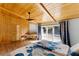 Beautiful bedroom featuring wood paneled ceiling and sliding glass doors to the outside deck at 725 Ingham Rd, New Smyrna Beach, FL 32168