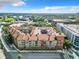 An aerial view of the residential complex under a bright sky showcases the unique architecture at 911 N Orange Ave # 528, Orlando, FL 32801