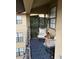 Cozy balcony with comfortable seating and privacy screens, offering a relaxing outdoor retreat with a view at 911 N Orange Ave # 528, Orlando, FL 32801