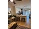 Bright kitchen with stainless steel appliances, modern cabinetry, and barstool seating at 911 N Orange Ave # 528, Orlando, FL 32801
