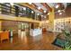 Spacious lobby with hardwood floors, modern lighting, and comfortable seating areas, perfect for socializing at 911 N Orange Ave # 528, Orlando, FL 32801