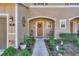 The inviting entryway is beautifully landscaped with a walkway to the front door at 94 Bella Vita Way, Ormond Beach, FL 32174