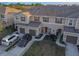 Charming townhome exterior with attached garages, well-kept lawns, and inviting front entrances, enhancing curb appeal at 94 Bella Vita Way, Ormond Beach, FL 32174