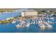 Stunning aerial view of the condominium complex nestled near a marina, offering a vibrant waterfront lifestyle at 101 N Riverside Dr # 214, New Smyrna Beach, FL 32169