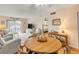Cozy living room features a balcony, with view into the bedroom at 101 N Riverside Dr # 214, New Smyrna Beach, FL 32169