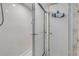 Clean and well-maintained shower area with modern fixtures and a glass door at 101 N Riverside Dr # 214, New Smyrna Beach, FL 32169
