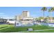 Captain's Quarters condominium complex signage at 101 North Riverside Drive with palm trees in the background at 101 N Riverside Dr # 214, New Smyrna Beach, FL 32169