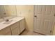 Bathroom featuring a vanity with a mirror, ample countertop space, and tile flooring at 108 Lake Fairgreen Cir, New Smyrna Beach, FL 32168