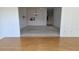 The living room has neutral carpeting, hardwood floors, and a chandelier at 108 Lake Fairgreen Cir, New Smyrna Beach, FL 32168
