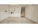 The living room has neutral carpeting and a chandelier at 108 Lake Fairgreen Cir, New Smyrna Beach, FL 32168