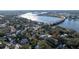 Stunning aerial view showcasing the home's location near the Halifax River, beaches, and the vibrant coastal community at 111 Esther St, New Smyrna Beach, FL 32169