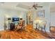 Finished basement with stylish furnishings and adjacent bathroom and desk nook at 111 Esther St, New Smyrna Beach, FL 32169
