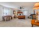 Comfortable bedroom featuring a bed, work station, sitting area, and natural light at 111 Esther St, New Smyrna Beach, FL 32169