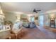 Spacious main bedroom with sitting area and traditional furniture provides a serene and inviting retreat at 111 Esther St, New Smyrna Beach, FL 32169