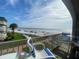 Relax on your private balcony with views of the beach and ocean at 111 N Atlantic Ave # A219, New Smyrna Beach, FL 32169