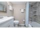 Bright bathroom with shower and bathtub at 111 N Atlantic Ave # A219, New Smyrna Beach, FL 32169