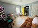 Cozy bedroom with hardwood floors, closet, and plenty of natural light at 1136 Elizabeth St, New Smyrna Beach, FL 32168