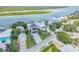 Aerial view of modern waterfront home showcasing its prime location and stylish design at 1194 N Peninsula, New Smyrna Beach, FL 32169