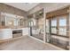 Modern bathroom with double vanity, soaking tub, glass shower, and sauna at 1194 N Peninsula, New Smyrna Beach, FL 32169