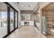 Spacious bathroom with double vanity, large mirror, and access to an outdoor balcony at 1194 N Peninsula, New Smyrna Beach, FL 32169