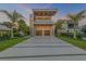 Stunning modern home with multiple balconies, pool, and sleek architectural design at 1194 N Peninsula, New Smyrna Beach, FL 32169